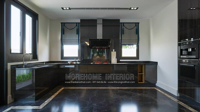 Mẫu tủ bếp biệt thự này được phân chia thành hai phần công năng tách biệt đó là: phần khu vực đặt bếp điện từ (khu vực nóng) và khu vực bồn chậu rửa chế biến thực phẩm. Tủ bếp đẹp